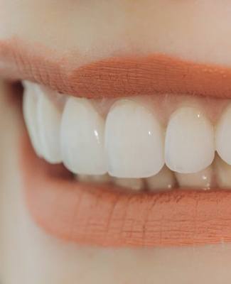close up of smile with straight white teeth 