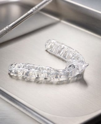 mouthguard on silver tray