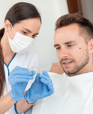 Man at dentist getting Invisalign in Federal Way