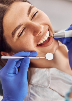 Woman smiling in the dental chair