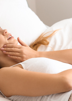 Woman with tooth pain