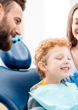 Child smiling at the dentist