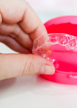 Invisalign in a pink case