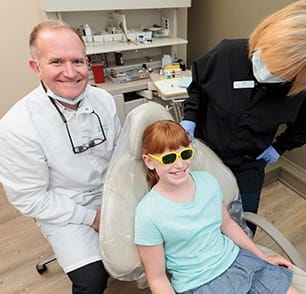 Dr Drew Beaty with a patient