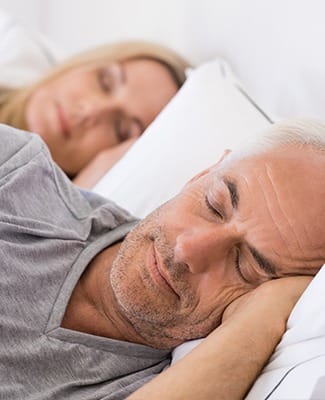 husband and wife sleeping