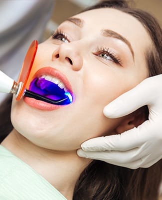 woman getting sealants