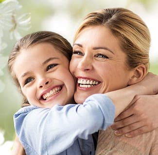 mother and daughter hugging