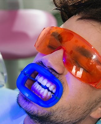 man getting teeth whitening