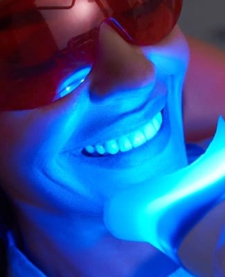 close up woman getting teeth whitening in Federal Way