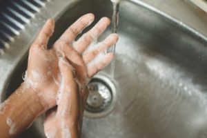 dentist in Federal Way washing their hands 