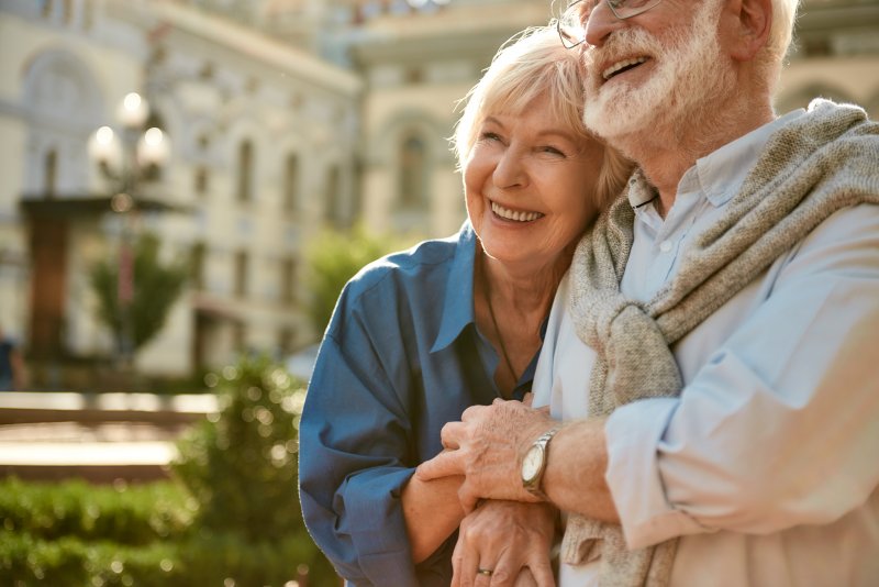 couple smiling with dental implants in Federal Way