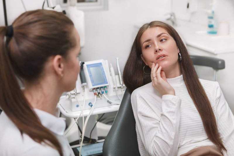 Patient talking to dentist about a root canal