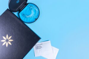 Invisalign tray along with bag of cleaning crystals.